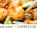 Chinese-style stir-fry of shrimp, shiitake mushrooms and Chinese cabbage, cooking scene. 130801238