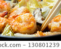 Chinese-style stir-fry of shrimp, shiitake mushrooms and Chinese cabbage, cooking scene. 130801239
