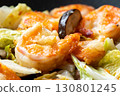 Chinese-style stir-fry of shrimp, shiitake mushrooms and Chinese cabbage, cooking scene. 130801245