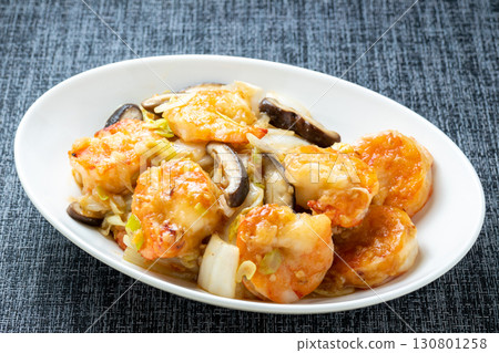 Chinese-style stir-fry of shrimp, shiitake mushrooms, and Chinese cabbage. Chinese-style stir-fry of shrimp, shiitake mushrooms, and Chinese cabbage. 130801258