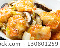 A close-up of Chinese-style stir-fried shrimp, shiitake mushrooms and Chinese cabbage. 130801259