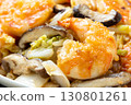 A close-up of Chinese-style stir-fried shrimp, shiitake mushrooms and Chinese cabbage. 130801261