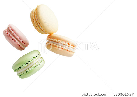 Assortment of small colorful in different flavors and textures floating mid air on a plain light colored background with ample copy space Assortment of small colorful in different flavors and textures floating mid air on a plain light colored background with ample copy space 130801557