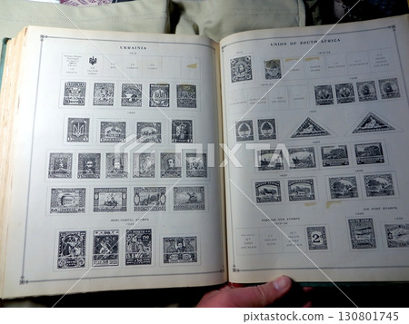 Discovering Ukrainian and South African Stamps in a Junior International Postage Stamp Album Discovering Ukrainian and South African Stamps in a Junior International Postage Stamp Album 130801745