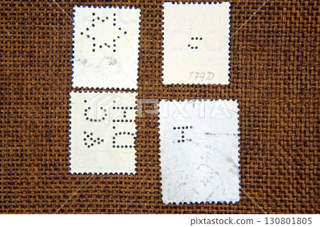Exploring the Intricate World of Postage Stamps Perfins in a Captivating Philatelic Collection 130801805