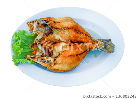 Top view of Deep-fried Sea bass with Fish Sauce, focus selective Top view of Deep-fried Sea bass with Fish Sauce, focus selective 130802242