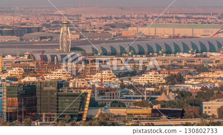 View of modern buildings in luxury Dubai city at sunset aerial timelapse 130802733