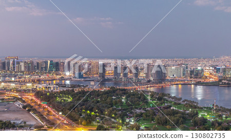 View of lights from illuminated roads and windows in luxury Dubai city, United Arab Emirates Timelapse Aerial View of lights from illuminated roads and windows in luxury Dubai city, United Arab Emirates Timelapse Aerial 130802735
