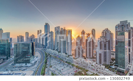 Modern residential and office complex with many towers aerial timelapse at Business Bay, Dubai, UAE. Modern residential and office complex with many towers aerial timelapse at Business Bay, Dubai, UAE. 130802749