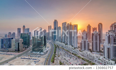 Modern residential and office complex with many towers aerial timelapse at Business Bay, Dubai, UAE. Modern residential and office complex with many towers aerial timelapse at Business Bay, Dubai, UAE. 130802757