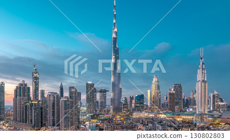 Dubai Downtown skyline day to night timelapse with Burj Khalifa and other towers panoramic view from the top in Dubai Dubai Downtown skyline day to night timelapse with Burj Khalifa and other towers panoramic view from the top in Dubai 130802803
