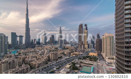 Dubai Downtown skyline day to night timelapse with Burj Khalifa and other towers paniramic view from the top in Dubai Dubai Downtown skyline day to night timelapse with Burj Khalifa and other towers paniramic view from the top in Dubai 130802810