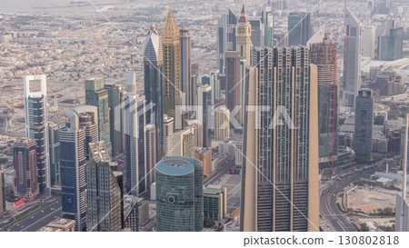 Downtown of Dubai in the morning timelapse after sunrise. Aerial view with towers and skyscrapers Downtown of Dubai in the morning timelapse after sunrise. Aerial view with towers and skyscrapers 130802818