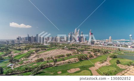 Dubai Marina skyscrapers and golf course morning timelapse, Dubai, United Arab Emirates Dubai Marina skyscrapers and golf course morning timelapse, Dubai, United Arab Emirates 130802852