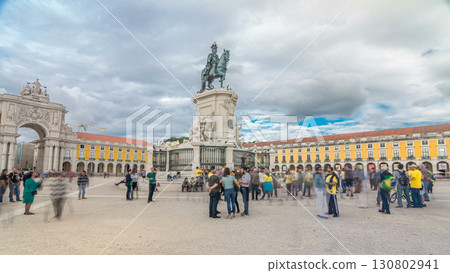 Bronze statue of King Jose I and triumphal arch at Rua Augusta at Commerce square timelapse hyperlapse in Lisbon, Portugal. Bronze statue of King Jose I and triumphal arch at Rua Augusta at Commerce square timelapse hyperlapse in Lisbon, Portugal. 130802941