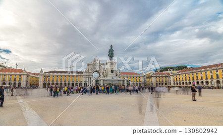 Triumphal arch at Rua Augusta and bronze statue of King Jose I at Commerce square timelapse hyperlapse in Lisbon, Portugal. Triumphal arch at Rua Augusta and bronze statue of King Jose I at Commerce square timelapse hyperlapse in Lisbon, Portugal. 130802942