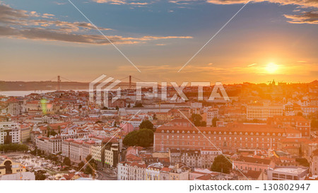 Lisbon at sunset aerial panorama view of city centre with red roofs at Autumn evening timelapse, Portugal Lisbon at sunset aerial panorama view of city centre with red roofs at Autumn evening timelapse, Portugal 130802947