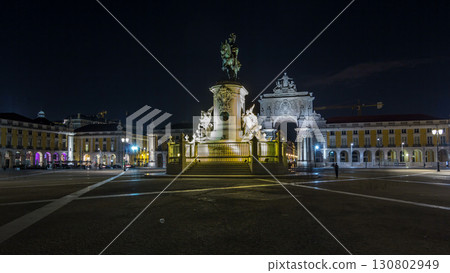 Triumphal arch at Rua Augusta and bronze statue of King Jose I at Commerce square night timelapse hyperlapse in Lisbon, Portugal. Triumphal arch at Rua Augusta and bronze statue of King Jose I at Commerce square night timelapse hyperlapse in Lisbon, Portugal. 130802949