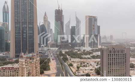 Dubai downtown skyline at morning aerial timelapse with traffic on highway 130803015