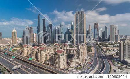 Skyline view of the buildings of Sheikh Zayed Road and DIFC timelapse in Dubai, UAE. 130803024