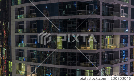 Scenic glowing windows of skyscrapers at evening timelapse Scenic glowing windows of skyscrapers at evening timelapse 130803046