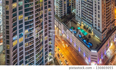 Scenic glowing windows of skyscrapers at night timelapse 130803055