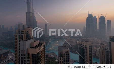 Foggy morning in downtown of Dubai night to day timelapse. 130803094
