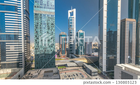 Skyline view of the buildings of Sheikh Zayed Road and DIFC all day timelapse in Dubai, UAE. 130803123