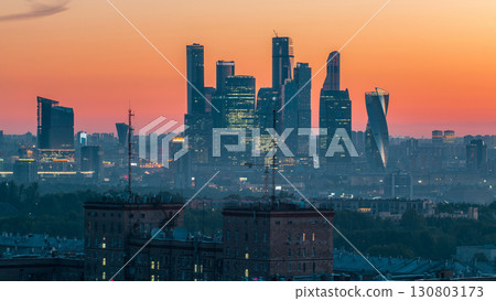 Cityscape night to day timelapse, residential buildings, park areas, group of Moscow City skyscrapers Cityscape night to day timelapse, residential buildings, park areas, group of Moscow City skyscrapers 130803173