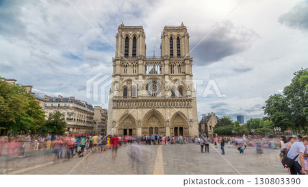 Front view of Notre-Dame de Paris timelapse hyperlapse, a medieval Catholic cathedral on the Cite Island in Paris, France 130803390