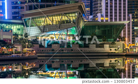 Residential buildings in Jumeirah Lake Towers timelapse in Dubai, UAE. 130803457