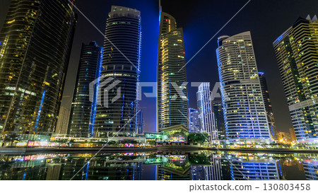 Residential buildings in Jumeirah Lake Towers timelapse hyperlapse in Dubai, UAE. Residential buildings in Jumeirah Lake Towers timelapse hyperlapse in Dubai, UAE. 130803458