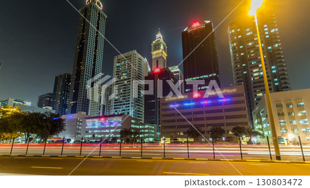 Downtown Dubai towers night timelapse hyperlapse. View of Sheikh Zayed road with tall skyscrapers. 130803472