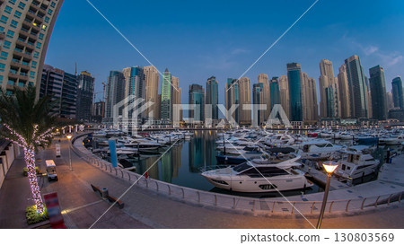 Dubai Marina at Blue hour night to day timelapse with yachts Dubai Marina at Blue hour night to day timelapse with yachts 130803569