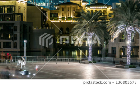 Square with horse monument near Souk in downtown timelapse in Dubai, UAE Square with horse monument near Souk in downtown timelapse in Dubai, UAE 130803575