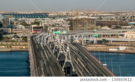Business bay crossing bridge timelapse, 13-lane-bridge, over the Dubai Creek Business bay crossing bridge timelapse, 13-lane-bridge, over the Dubai Creek 130803612
