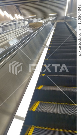 Escalators on the station platform. Escalators on the station platform. 130804048