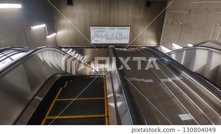 Escalators on the station platform. Escalators on the station platform. 130804049