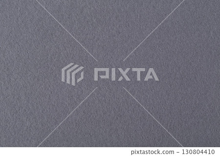 Macro of dark grey felt texture for backgrounds. Macro of dark grey felt texture for backgrounds. 130804410