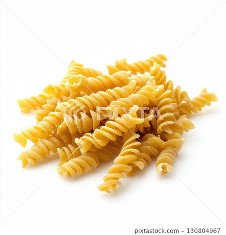 Fresh yellow rotini pasta isolated on white background Fresh yellow rotini pasta isolated on white background 130804967