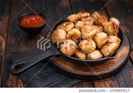 Delicious meatballs, meat patties, showcasing a golden crust and tender interior. isolated on wooden background. top view 130805017