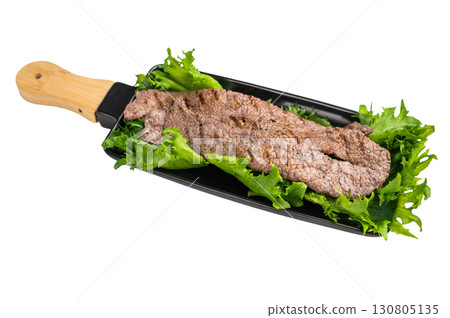 Sizzling yakiniku wagyu bees strips, featuring an array of marinated meats and fresh vegetables, grilled to perfection. A delightful Japanese BBQ. isolated on white background. top view Sizzling yakiniku wagyu bees strips, featuring an array of marinated meats and fresh vegetables, grilled to perfection. A delightful Japanese BBQ. isolated on white background. top view 130805135