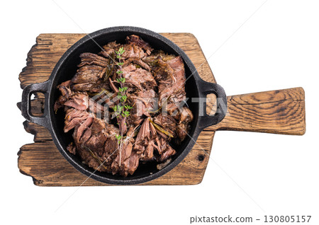 Slow cooked Shredded beef ragu in a skillet isolated on a white background. top view 130805157