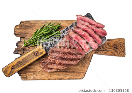 Savory shoulder steak Denver, beautifully cooked on the grill, highlighting its marbled texture and succulent taste. isolated on white background. top view 130805168