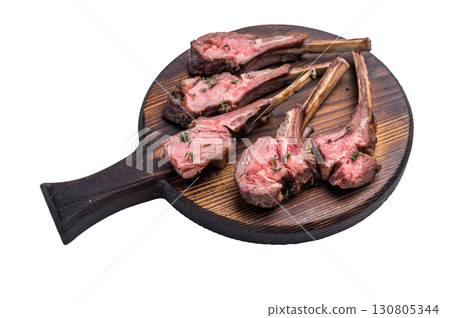 French roast lamb chops, mutton meat steaks on wooden board isolated on white backgrounds 130805344