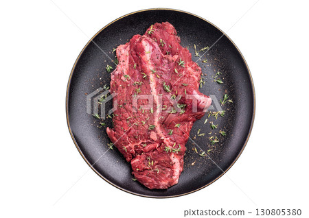 Raw hanger tender beef steak, skirt steak on plate with herbs and spices isolated on white background. top view 130805380
