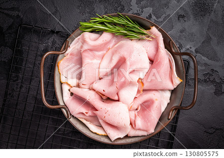 Pork Ham, Sliced Prosciutto Cotto on steel tray. black background. top view 130805575
