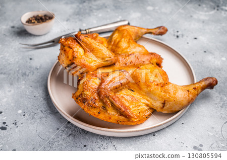 Roasted Spatchcock Chicken, poultry meat. grey background. top view 130805594