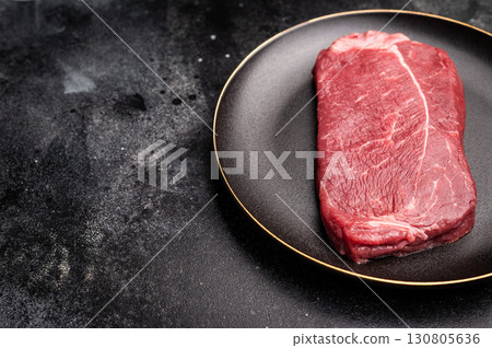 Fresh raw Rump beef steak, organic meat. black background. top view 130805636