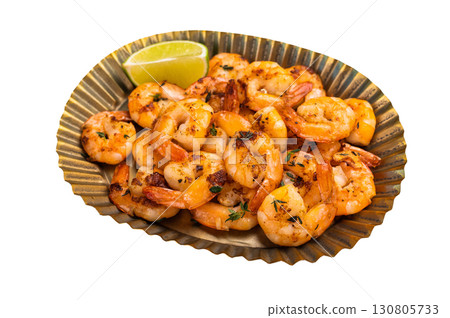 Roasted Shrimps Prawns in a metal plate isolated on white background. Roasted Shrimps Prawns in a metal plate isolated on white background. 130805733